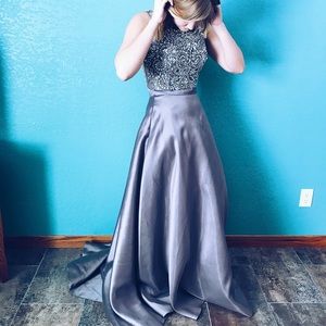 Two-piece prom dress. Size 4-6 and the color is grey.